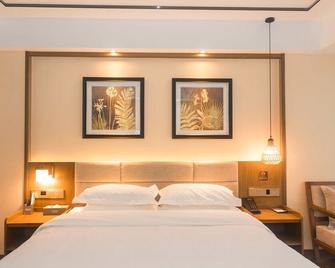 Infully Hotel - Mianyang - Mian Yang - Slaapkamer