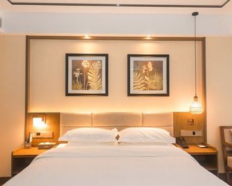 Infully Hotel - Mianyang - Mianyang - Camera da letto