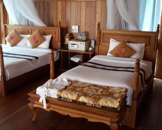 Golden Island Cottages Nampan Hotel - Nyaungshwe - Κρεβατοκάμαρα