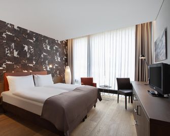 Tailormade Hotel Sihlpark Schindellegi - Feusisberg - Camera da letto