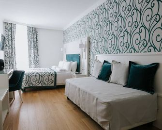 هوتل سيتا دي بارينزو - تريست - غرفة نوم