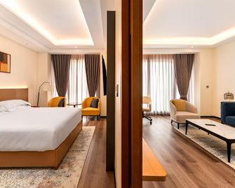 Bamus Sarovar Portico Kampala - Кампала - Спальня