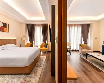Bamus Sarovar Portico Kampala - קמפאלה - חדר שינה