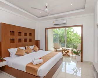 Sprise Munnar Resort and Spa - Munnar - Bedroom