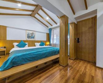 Lijiang Sunshine Inn - Lijiang - Bedroom
