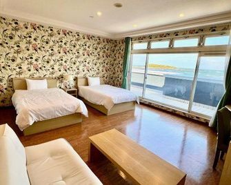 Aoshima Fisherman's Beachside Hostel & Spa - Miyazaki - Schlafzimmer