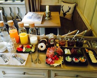 Boutiquehotel Säumler - צל אם צילר - בופה