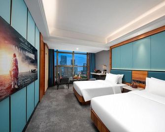 Huayi Hotel (Shenzhen North Railway Station) - Shenzhen - Soveværelse