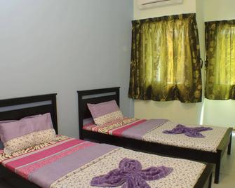 Borneo Sandakan Backpackers - Sandakan - Bedroom