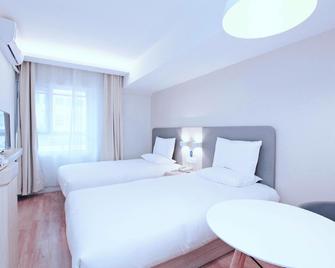 Hanting Hotel Nanjing Xinjiekou Metro Station - Nanjing - Bedroom