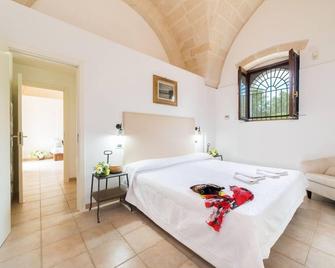 Tenuta del Barco WineRestaurant and Hospitality - Pulsano - Camera da letto