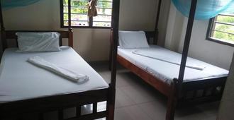 Cingaki Hotel - Mombasa - Schlafzimmer