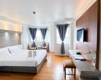 Thong Tarin Hotel - Surin - Schlafzimmer