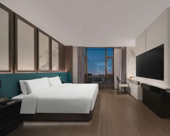 Qiqihar Platinum Hotel (Wanda Plaza Longsha Zoo Branch) - Qiqihar - Yatak Odası