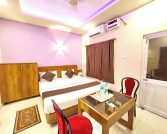 Goroomgo Blue Sagar Near Golden Beach Puri - Puri - Phòng ngủ