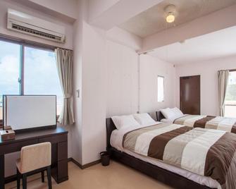 Kariyushi Condominium Resort Mezon Max - Okinawa - Sypialnia