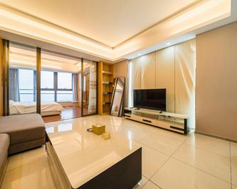 Phoenix International Serviced Apartment - Suzhou - Wohnzimmer