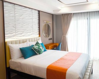 Puerto de San Juan Beach Resort Hotel and Residences - San Juan - Schlafzimmer