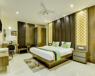 تريبو وينسم ريزورت وذ سويمينج بول - رانتشي - غرفة نوم