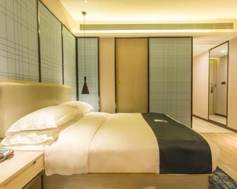 Echarm Hotel Danzhou Xiari Plaza - Danzhou - Bedroom