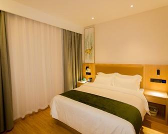 Greentree Inn Express Henan Xinyang Huaibin County - Čeng-čou - Ložnice