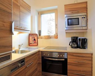 Wilder Kaiser or Kitzbüheler Horn double room with shower / WC - Pension Sunnbichl - Going - Cocina