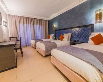 Hotel des Iles - אסאוירה - חדר שינה