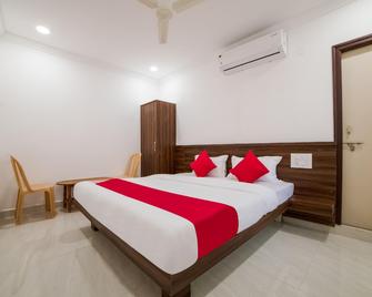 Hotel O Aria Inn - Karīmnagar - Bedroom