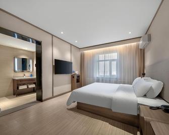 Hanting Hotel Qiqihar Railway Station - Qiqihar - Bedroom