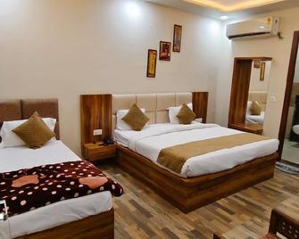 Hotel Taj Sarovar - Agra - Slaapkamer