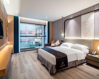 Ningbo Huagang Bund Hotel - Ningbo - Bedroom