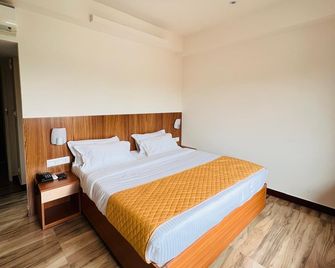 East Town Hotel - Palakkad - Habitación