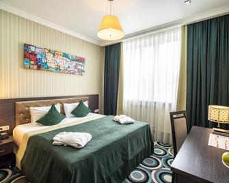 Mildom Hotel - Almaty - Phòng ngủ