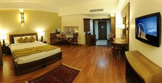 Comfort Inn Alstonia - Amritsar - Yatak Odası