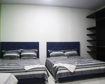 Cozy 3-bedroom house with WiFi, air conditioning, in the center of Leticia. - Leticia - Bedroom