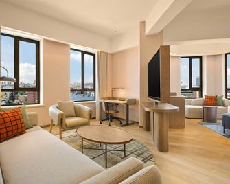Hilton Garden Inn Yingkou Zhanqian - Yingkou - Living room