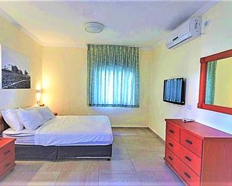 Nachsholim Holiday Village Hotel - Naẖsholim - Camera da letto