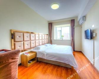 Xin'gang Business Hotel - Dandong - Bedroom
