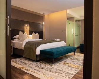 Happy Valley Hotel and Casino - אזולוויני - חדר שינה