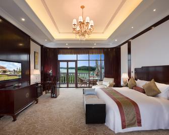 New Century Hotel Guian Guizhou - Anshun - Bedroom