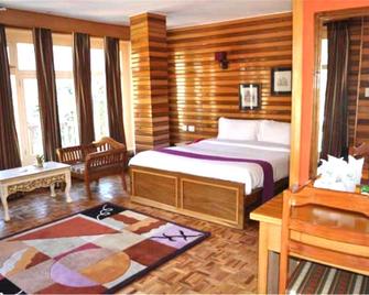 Apple Orchard Resort - Lachung - Bedroom