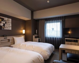 Hotel Route Inn Imizu - Toyama - Slaapkamer