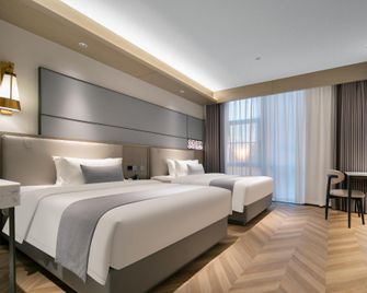 Madison Hotel Luzhou Jiangyang - Luzhou - Bedroom