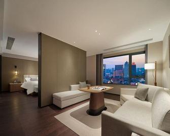 Ningbo World Hotel - Ningbo - Living room