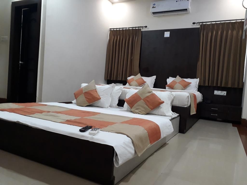 Hotel Nilay - Dwārka - Schlafzimmer