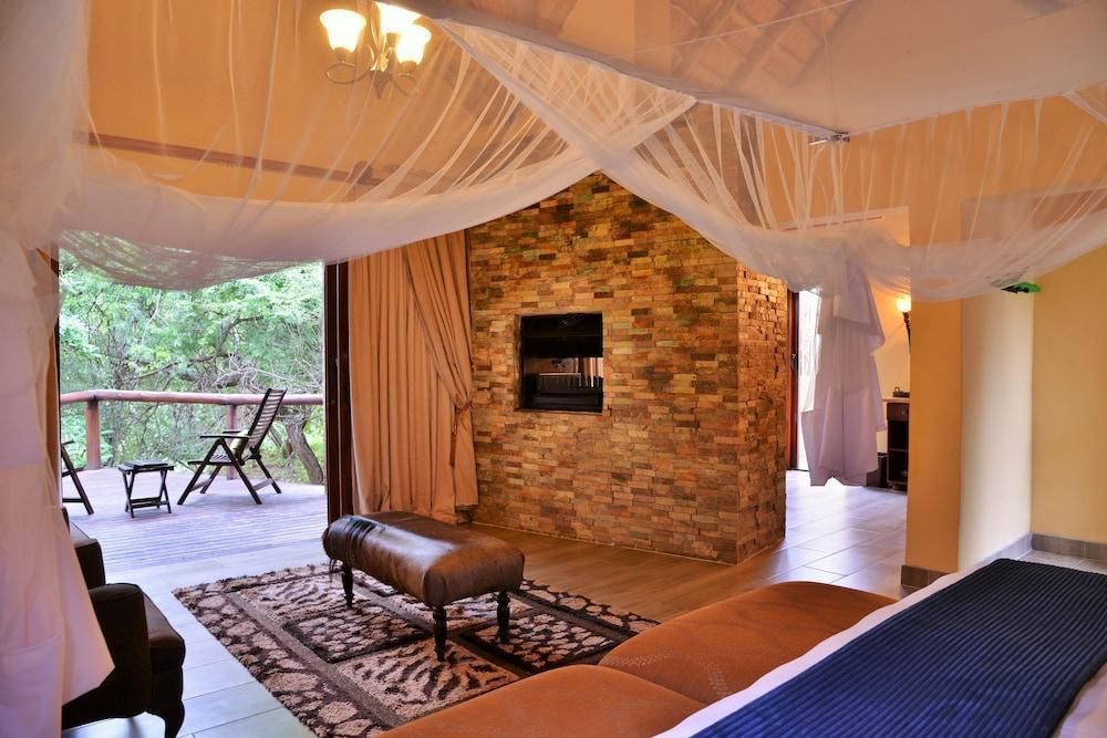 Shishangeni Main Lodge - Komatipoort - Schlafzimmer