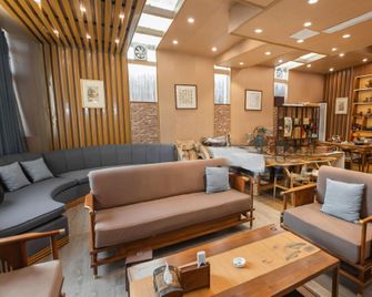 Gu Jin Yue Hotel (Qionghai Wetland Park Branch) - Liangshan - Lounge