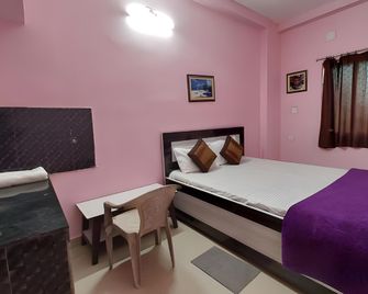 Goroomgo Jagannath Inn Puri - Near Sea Beach - Puri - Bedroom
