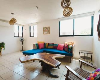 5 min from city center get away condo - Santa Cruz Huatulco - Living room