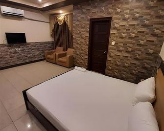 New Madina Hotel - Faisalābād - Bedroom